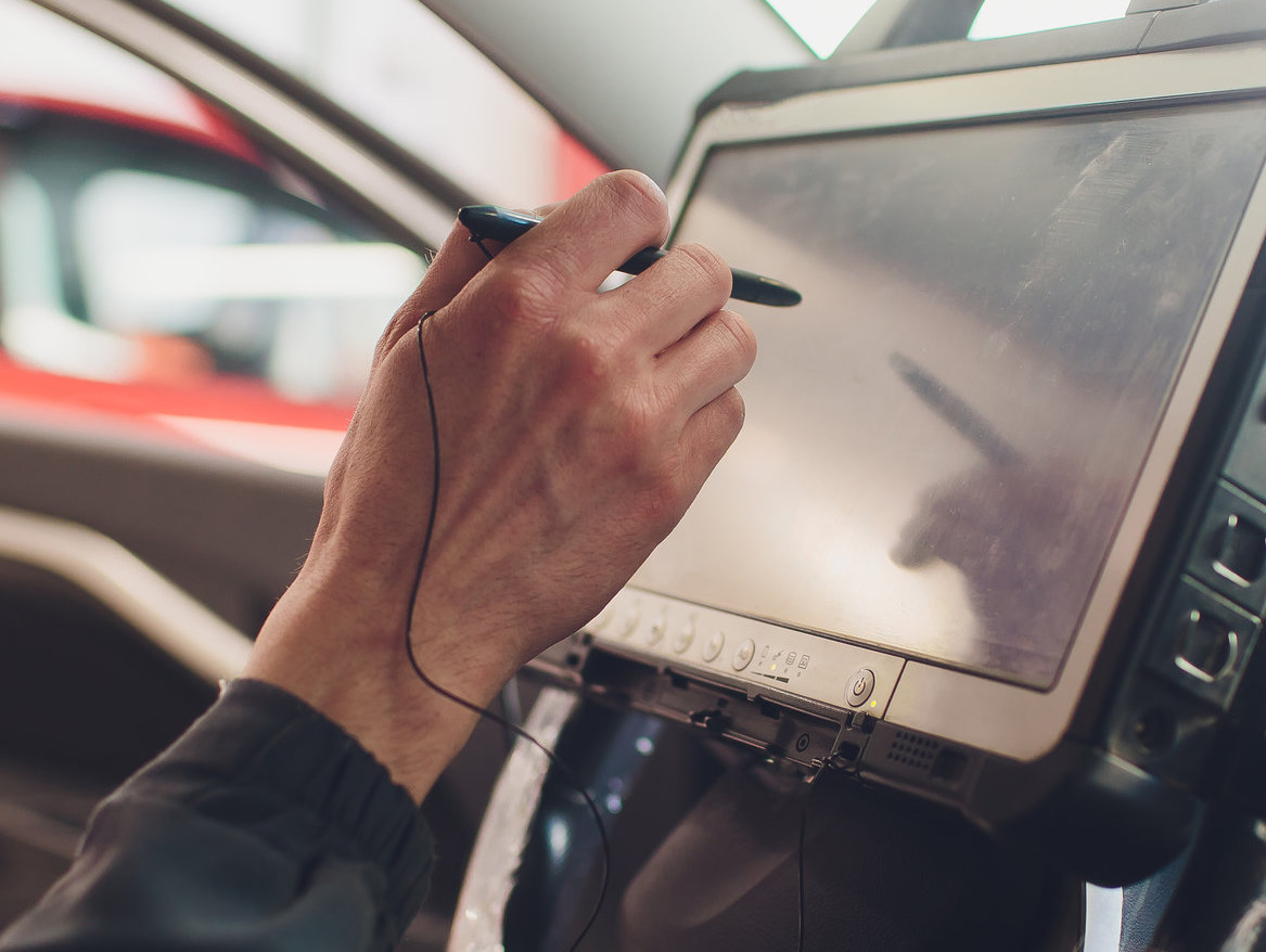 Mechanic diagnosing a vehicle - Servicing, Tyres & Repairs Edenbridge